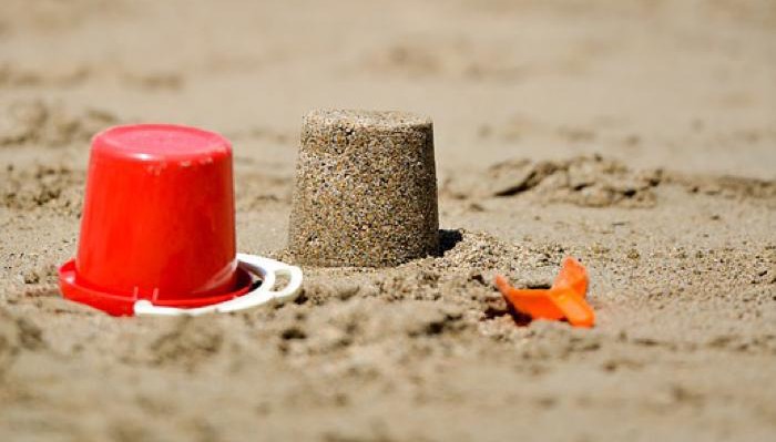 a bucket and spade at the seaside