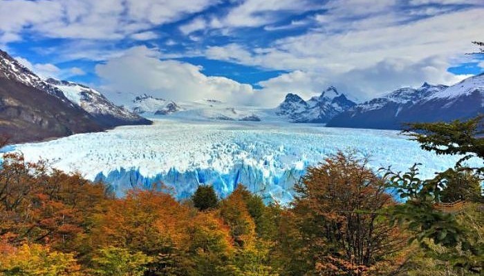 a glacier in the mountains with Perito Moreno Glacier in the background