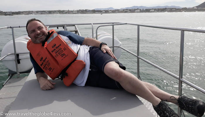 Man laying on a boat