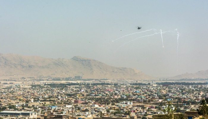 Helicopter shooting flares in Kabul