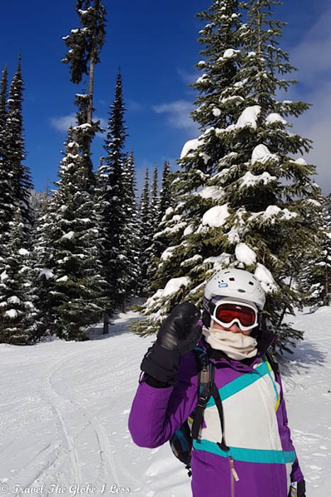 Anne on the ski slope waving