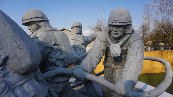 Firefighters at the Chernoby monument