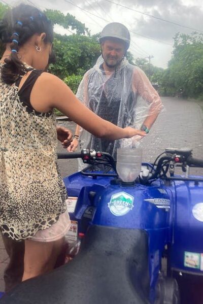 Refuelling the ATV on a rainy day in Ometepe