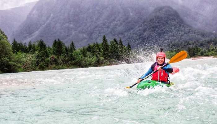 a person in a raft on a river