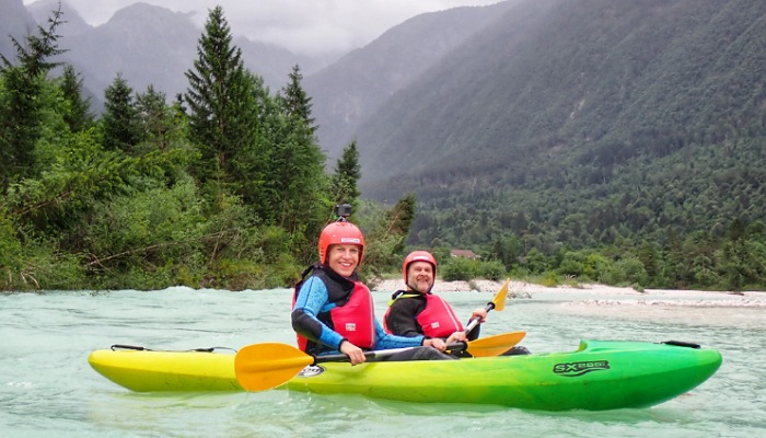 a couple of people in a kayak