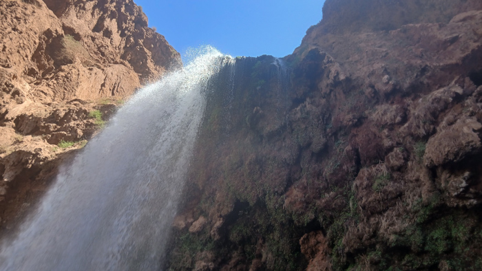 a waterfall in the mountains