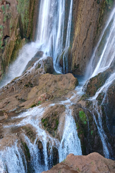 a waterfall on a rocky surface